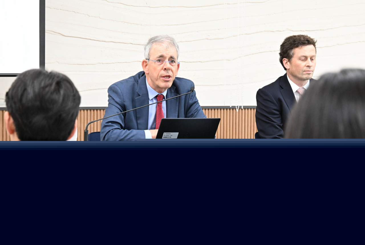 Vincent Koen (left), the head of country studies division of the OECD Economics Department, and Jon Pareliussen, a senior economist at OECD heading the Korea desk, hold a press briefing at the government complex building in Sejong on Thursday. (Ministry of Economy and Finance)
