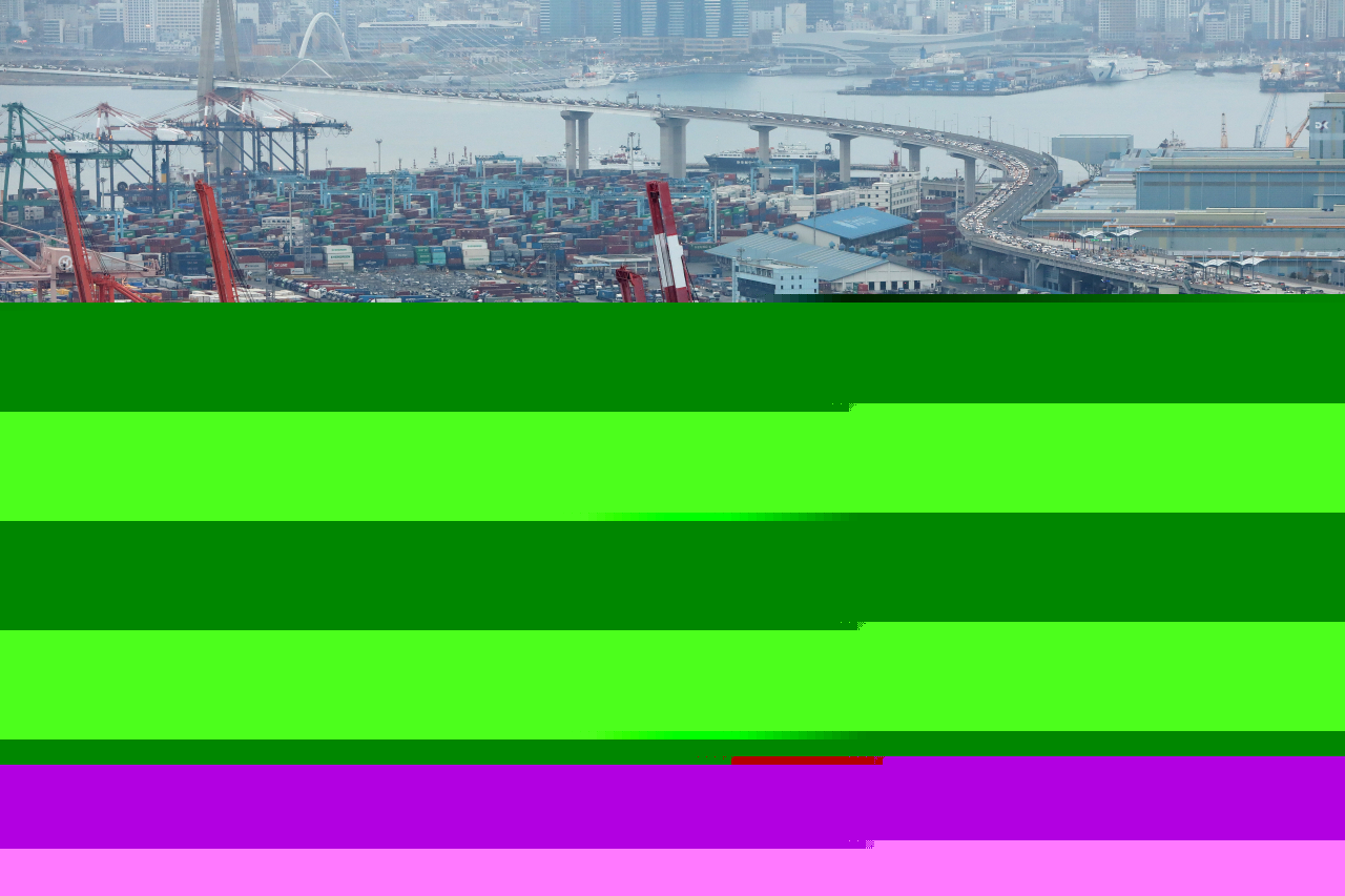 Shipping containers are stacked at a port in South Korea's largest port city of Busan, in this file photo taken on Nov. 5, 2021, (Getty images)