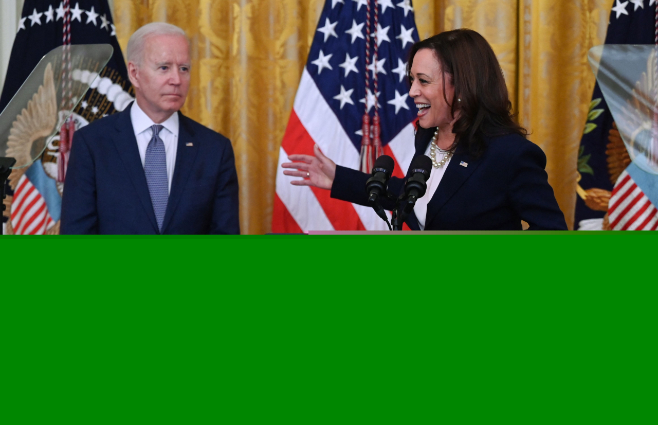Vice President Kamala Harris (right) speaks as President Joe Biden looks on during an event to mark the passage of the Juneteenth National Independence Day Act, in the East Room of the White House, June 17, 2021, in Washington. (AP)