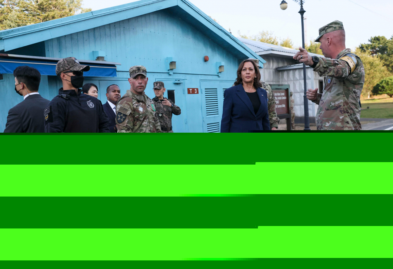 US Vice President Kamala Harris is given a tour near the demarcation line at the demilitarized zone (DMZ) separating North and South Korea, in Panmunjom on September 29, 2022. (Pool via AFP)