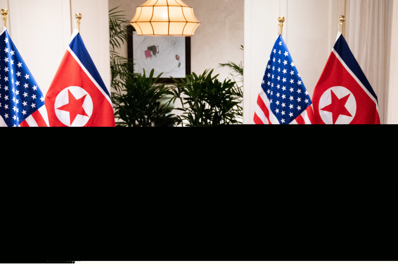 Then-US President Donald Trump and North Korean leader Kim Jong-un, meet for a social dinner on Feb. 27, 2019, at the Sofitel Legend Metropole hotel in Hanoi, for their second summit meeting. (White House)