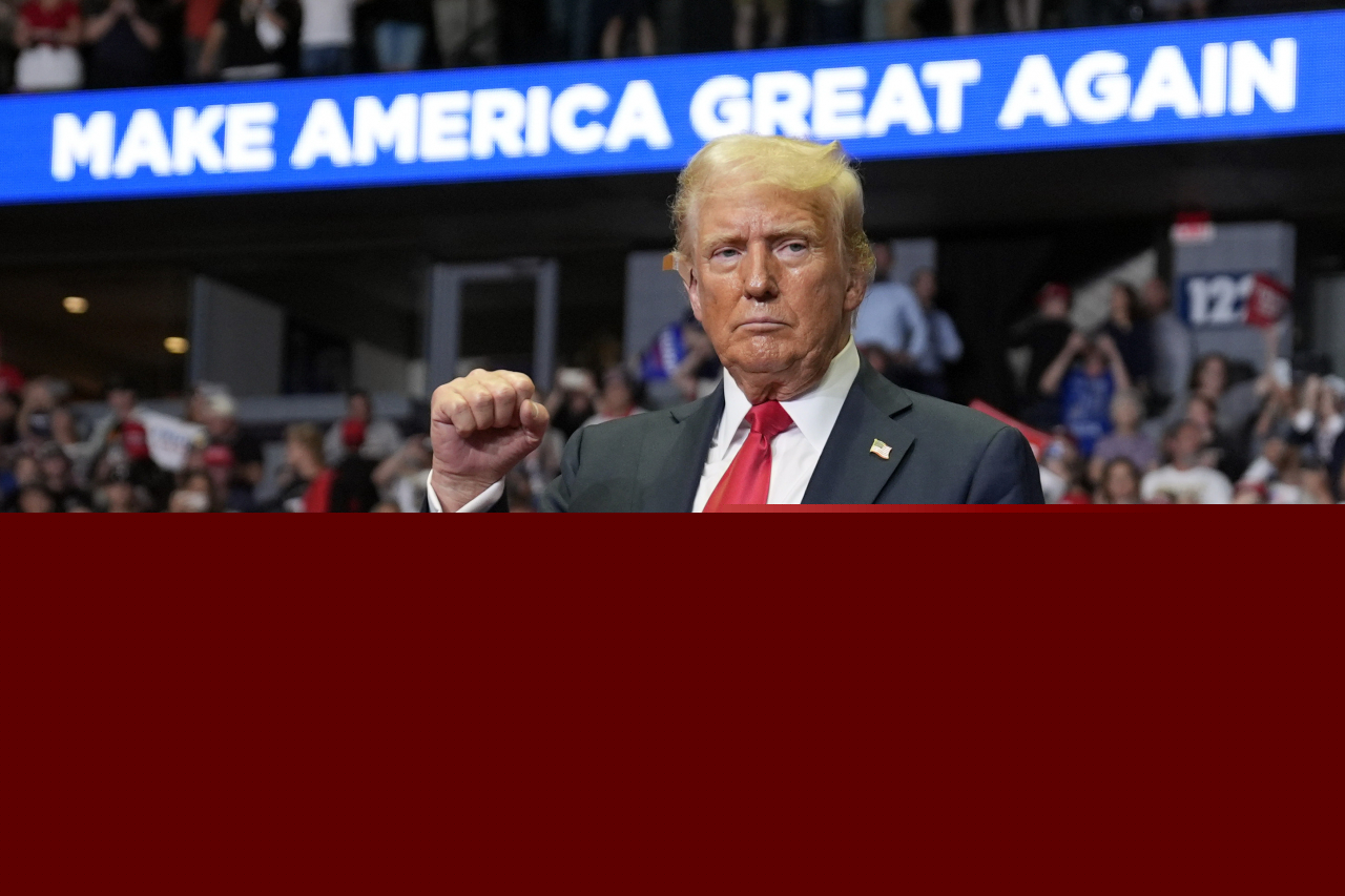 Republican presidential candidate former President Donald Trump reacts after speaking at a campaign rally on Saturday in Grand Rapids, Mich. (AP)