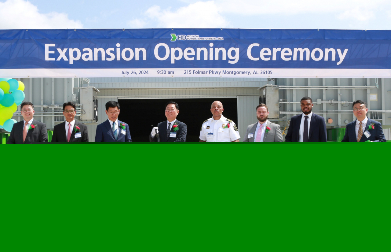 HD Hyundai Electric CEO Cho Seok (center left) and other company and state officials celebrate the expansion of the company's production plant in Alabama on Friday. (HD Hyundai Electric)