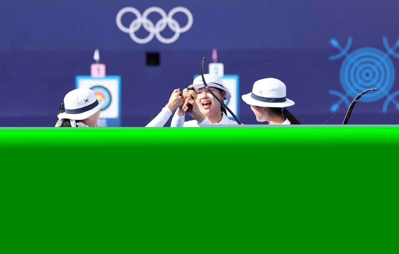 The South Korean women's archery team cheers after winning the gold medal in the women's team event Sunday at the Paris Olympics. (Yonhap)